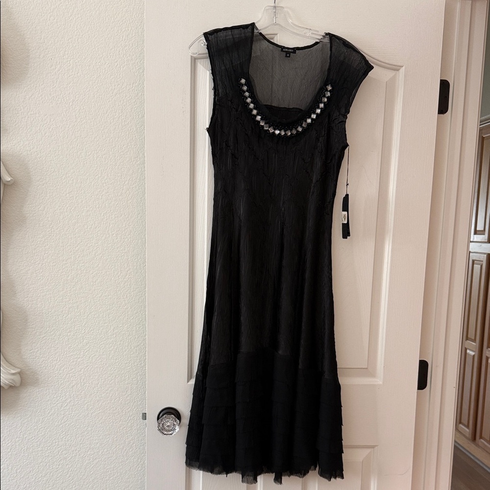 Elegant Black Midi Dress with Beaded Detail by Komarov